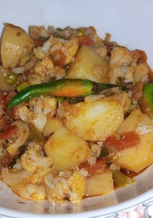 A picture of Aloo Gobhi with mix Sabzi.