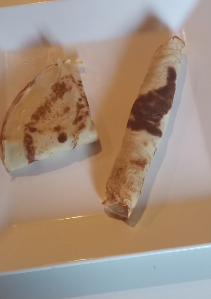 Una foto de Panqueques con dulce de leche