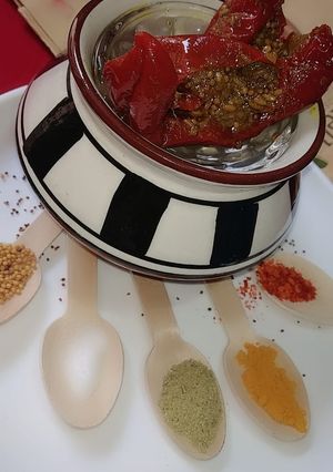 A picture of Stuffed red chilli pickle.