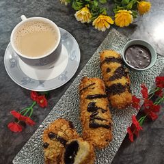 A picture of Chocolate Bread Roll with Coffee 🍫☕️.