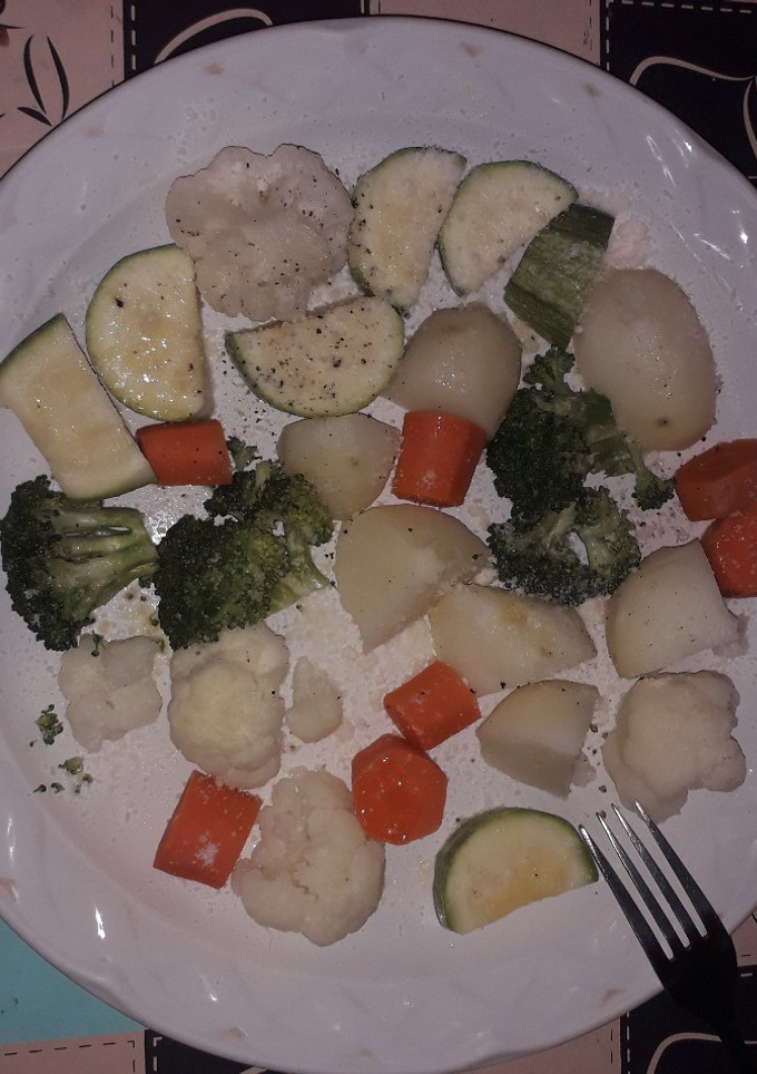 Una foto de Verduras con mantequilla y parmesano