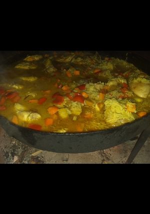 Una foto de Arroz con pollo al disco