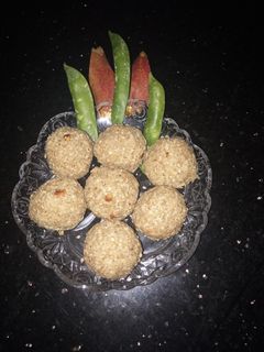 तिळगुळ लाडू रेसिपी (teelgud ladoo recipe in marathi) रेसिपी चे मुख्य फोटो 