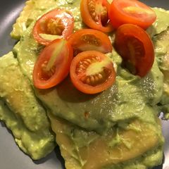 A picture of Vegan Spinach and Ricotta Ravioli with Avocado Sauce.