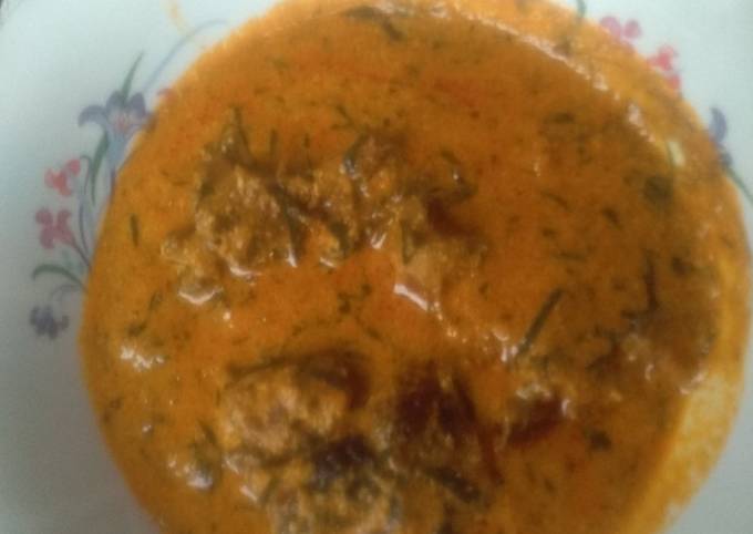 Egusi soup with palm fruits