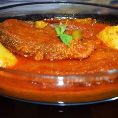 A picture of Traditional Bengali Chital Fish Kalia Clown Knife fish gravy.