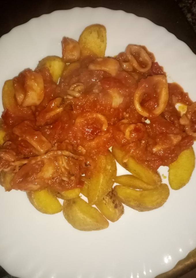 Una foto de Calamares en salsa