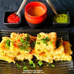 A picture of Green Chutney Sandwich Dhokla - Protein Packed Steamed Breakfast - Party Snacks.