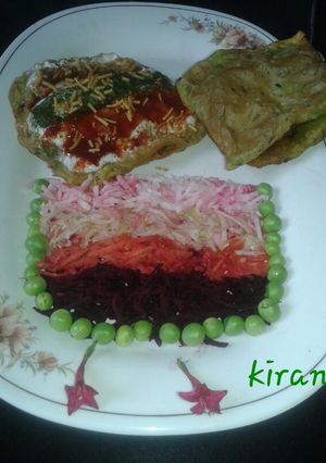 A picture of Potato stuffed palak puri.