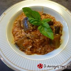 A picture of Trahana with eggplants in the tava.