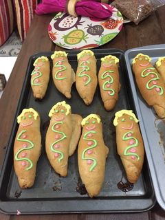 Una foto de Guaguas de pan (muñecas de pan)