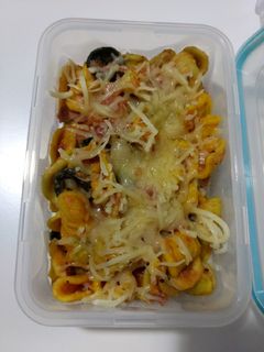 Una foto de Pasta con kumato y bacon