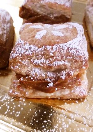 Foto principal de Libritos de hojaldre azucarados con dulce de leche