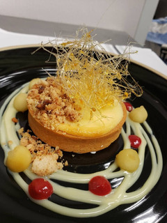 A picture of Chickpea Tart Banana & Cream Cheese Mousse with Peanut Crumble.