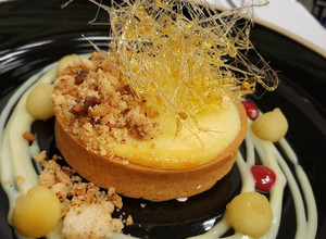 A picture of Chickpea Tart Banana & Cream Cheese Mousse with Peanut Crumble.