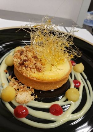 A picture of Chickpea Tart Banana & Cream Cheese Mousse with Peanut Crumble.