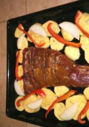 Una foto de Carne mechada con papas al horno