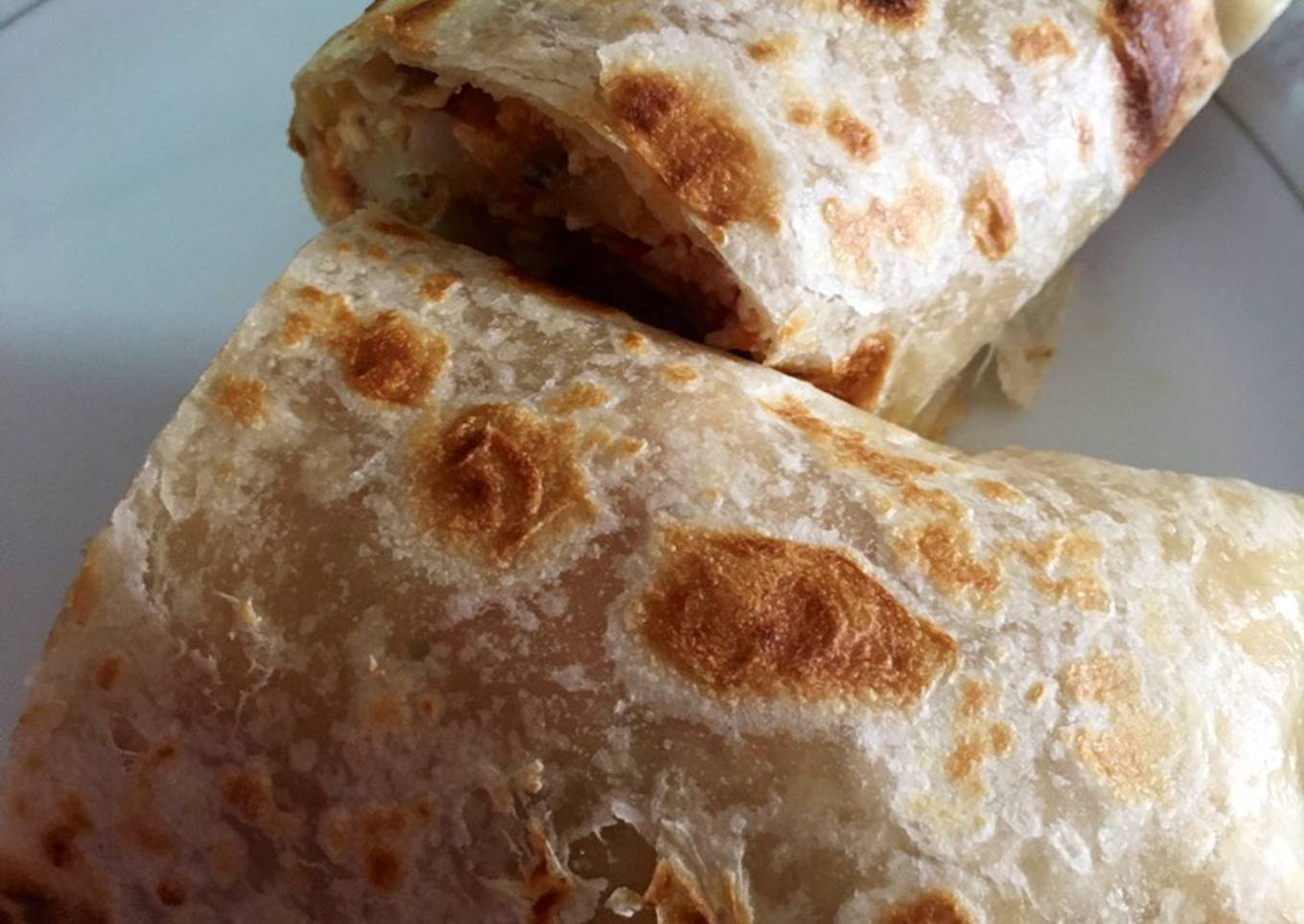 Burrito con guisado de papa y huevo