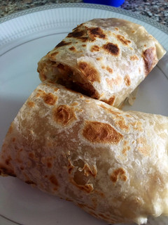 A picture of Burrito with Potato and Egg Stew.