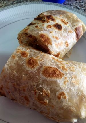 Una foto de Burrito con guisado de papa y huevo