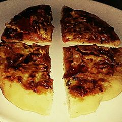 Tex's 2 Pig Pizza 🍅🐷🧀🍕🌿 A picture of Tex's 2 Pig Pizza 🍅🐷🧀🍕🌿.