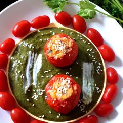 A picture of Baked Stuffed Tomato in Creamy Spinach.