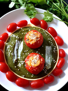 A picture of Baked Stuffed Tomato in Creamy Spinach.