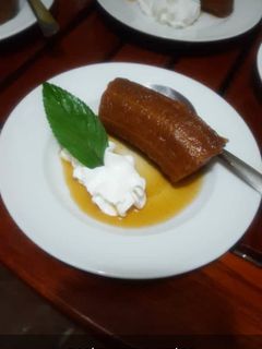 Una foto de Postre de plátano maduro en almíbar