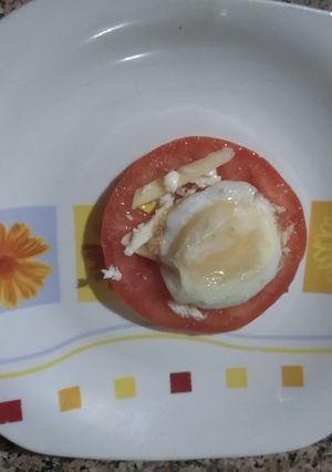 Une photo de Œuf de caille en plat au tomate 🍅