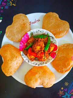 अचारी आलू- पूड़ी (achari aloo poori recipe in Hindi) रेसिपी मुख्य फोटो