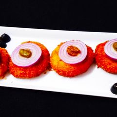 A picture of Stuffed onion rings.