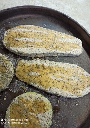 Una foto de Milanesas de berenjena con semillas