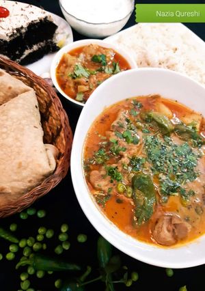 A picture of Aloo Matar Gosht.