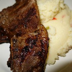 A picture of Braai pap and prime steak.