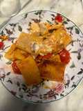 Paccheri nel BBQ con pomodori freschi e scorfano