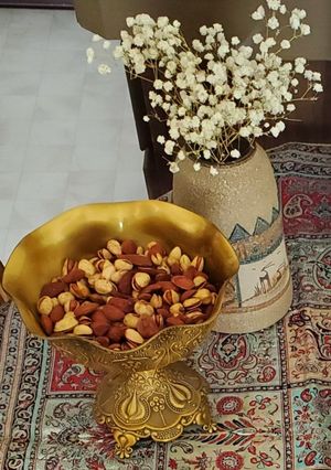 عکسی از دستور طریقه بو دادن، مزه دار و شور کردن آجیل خام در فر