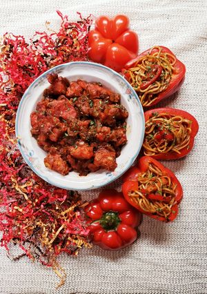 A picture of Bell Pepper stuffed noodles.