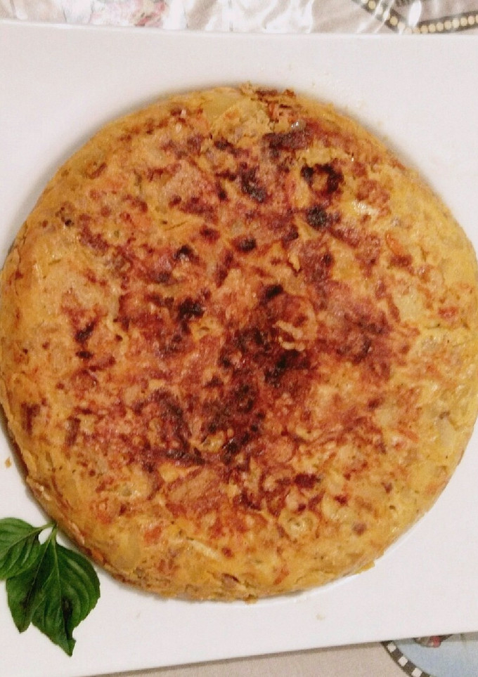 Una foto de Tortilla de patatas a la boloñesa de cerveza