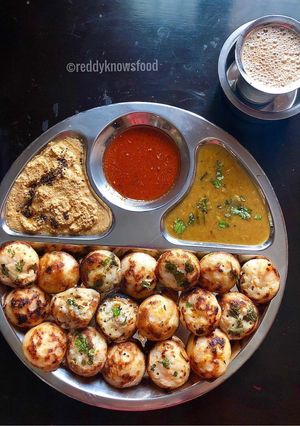 A picture of Vegetable appe with red chilli coconut chutney.