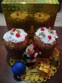 Una foto de Pan dulce con frutos secos y pasas de uvas