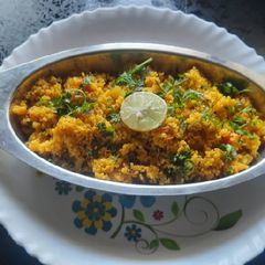A picture of (lapse upma)/daliya upma Broken wheat upma.