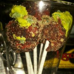 A picture of Red Velvet with Chocolate Ganache Cake Pops.