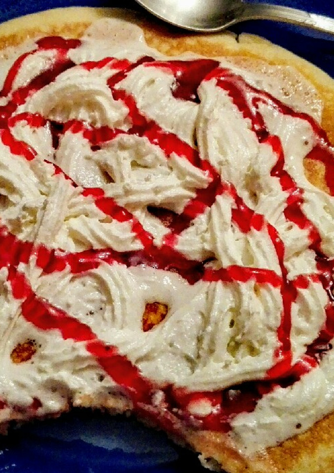 Una foto de Tortitas con Nata y Sirope de Fresa