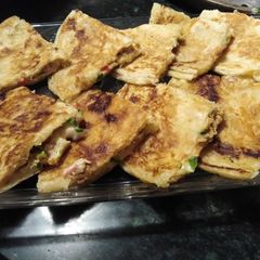 A picture of Chicken vegetable quesadilla.