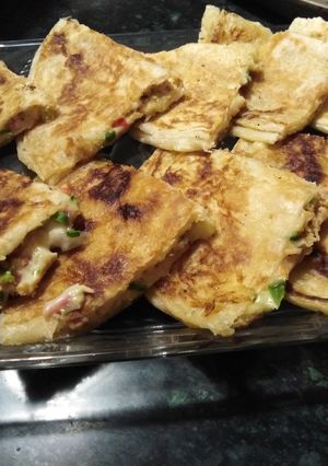 A picture of Chicken vegetable quesadilla.