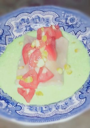 A picture of Shredded chicken Ravioli with Coriander and yogurt Chutney.