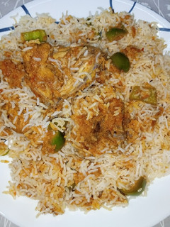 A picture of Chicken Sauce Biryani.