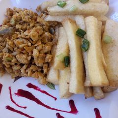 A picture of Fried yam with scrambled egg.