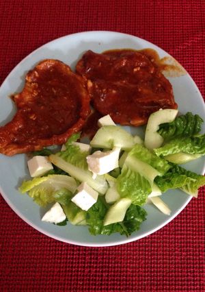 Una foto de Chuletas de lomo de cerdo entomatadas
