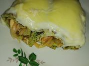 Una foto de lasagna de acelga con bechamel